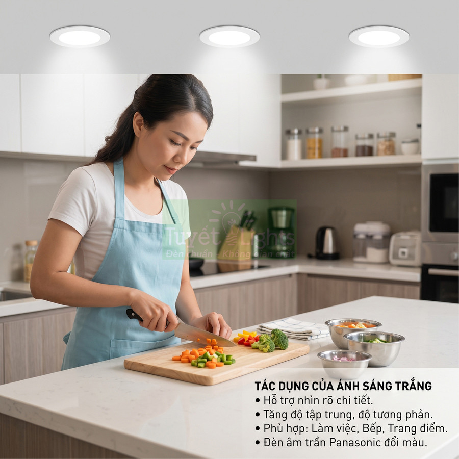 Đèn âm trần Panasonic ánh sáng trắng chiếu sáng khu bếp hiện đại nơi người phụ nữ đang chuẩn bị nấu ăn
