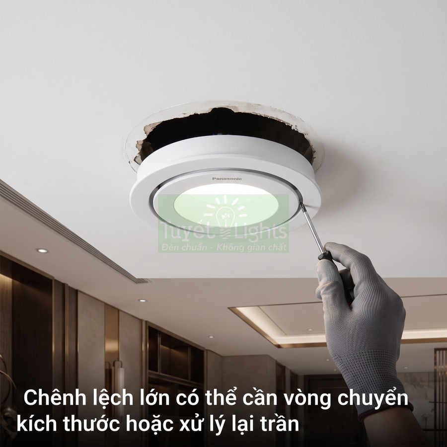 Lắp đặt đèn âm trần Panasonic với vòng chuyển kích thước trên trần thạch cao trong phòng khách