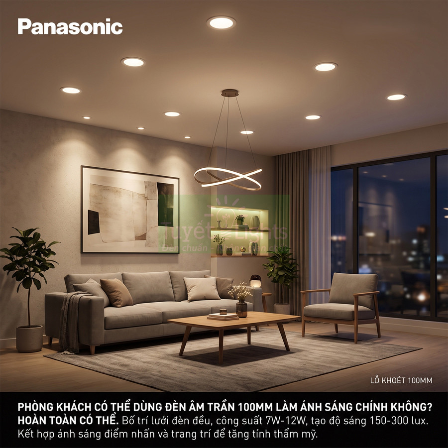 Đèn âm trần Panasonic 100mm chiếu sáng phòng khách hiện đại với sofa và bàn gỗ