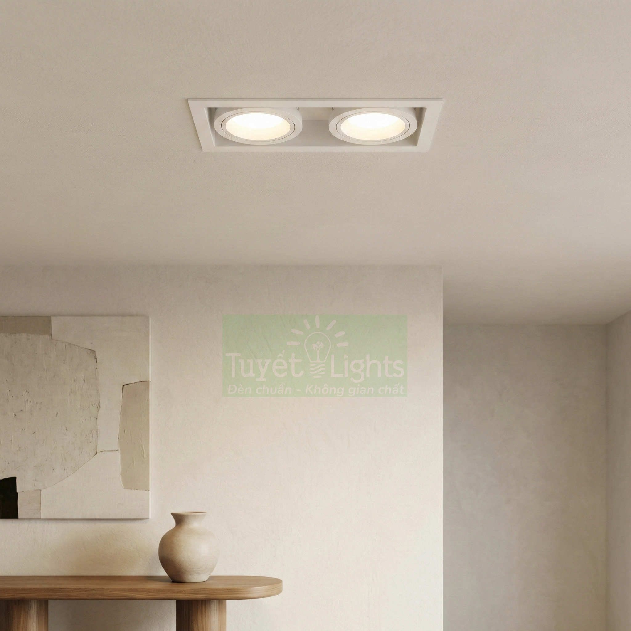 Đèn âm trần đôi Tuyết Lights chiếu sáng phòng khách tối giản với bàn gỗ và bình gốm