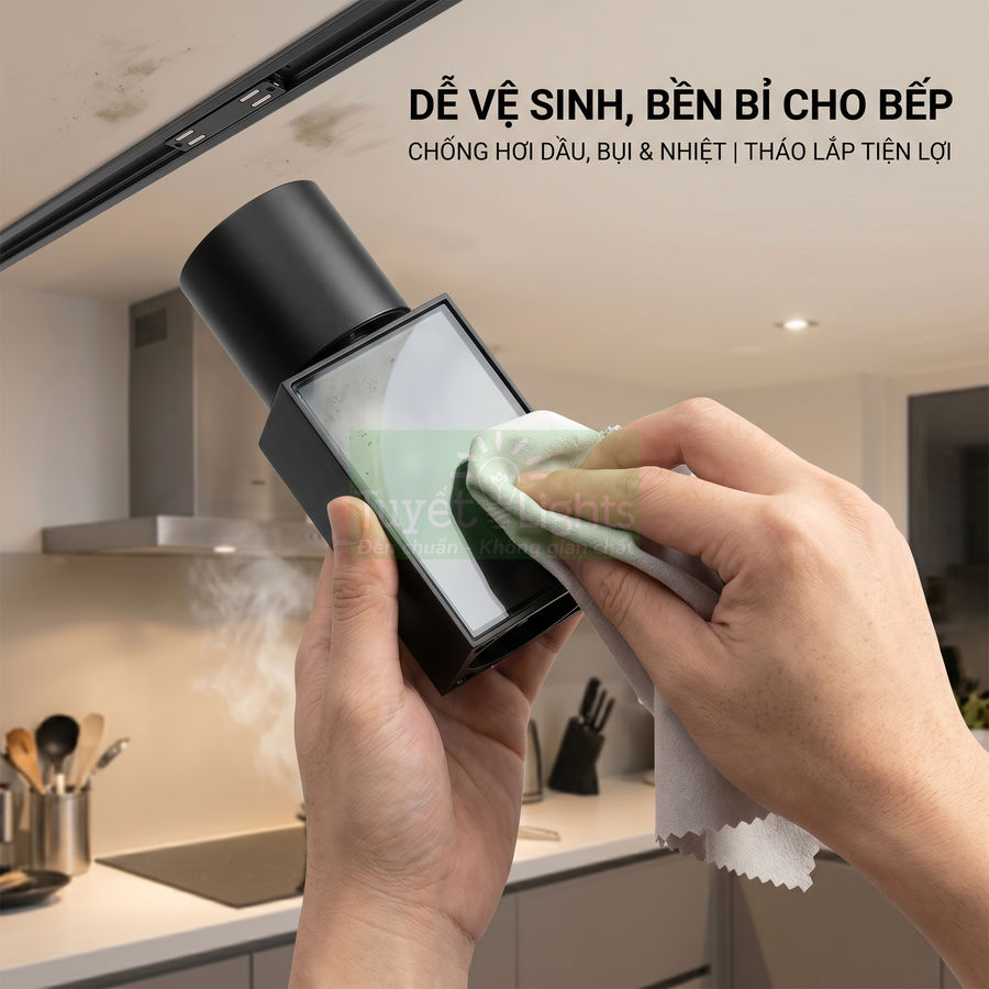 Vệ sinh đèn rọi ray màu đen trong bếp, thân đèn tháo rời dễ lau chùi chống bám dầu mỡ