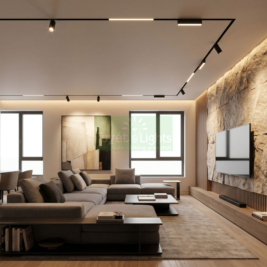 Phòng khách hiện đại với sofa chữ L màu xám, đèn rọi trần và tivi treo tường đá tự nhiên